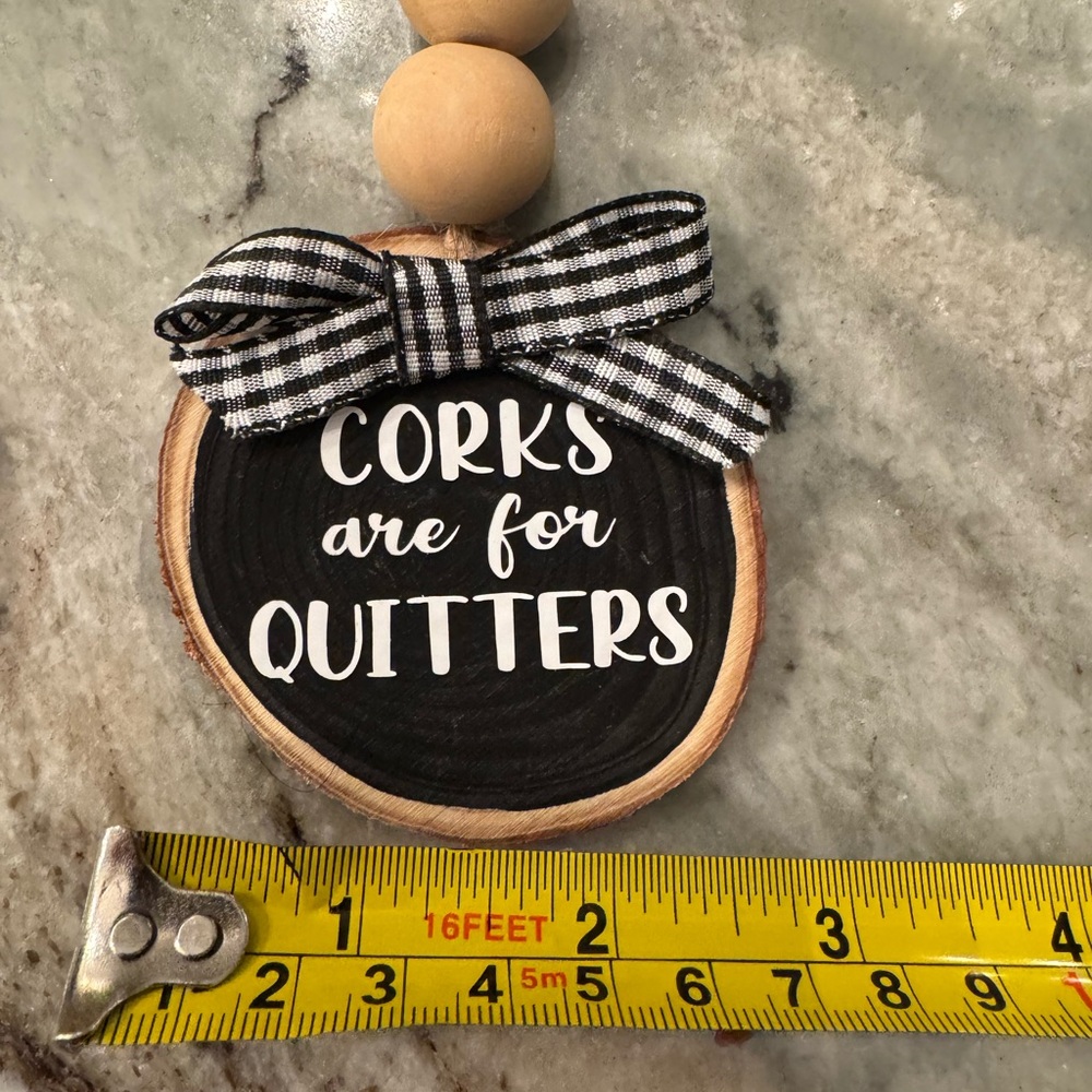 Pair of Wooden Bead Wine Bottle Charms with Whimsical Quotes - Picture 3 of 5
